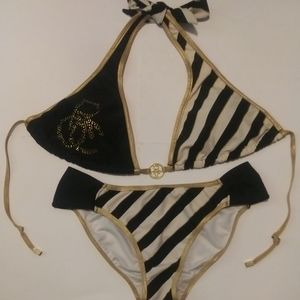 BLACK AND GOLD ROCAWEAR BATHING SUIT